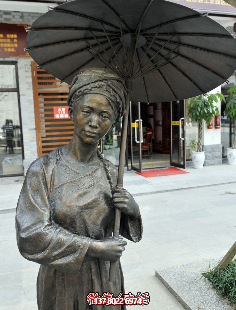 步行街打傘的少數(shù)民族人物銅雕女人雕塑 步行街打傘的少數(shù)民族人物銅雕女人雕塑